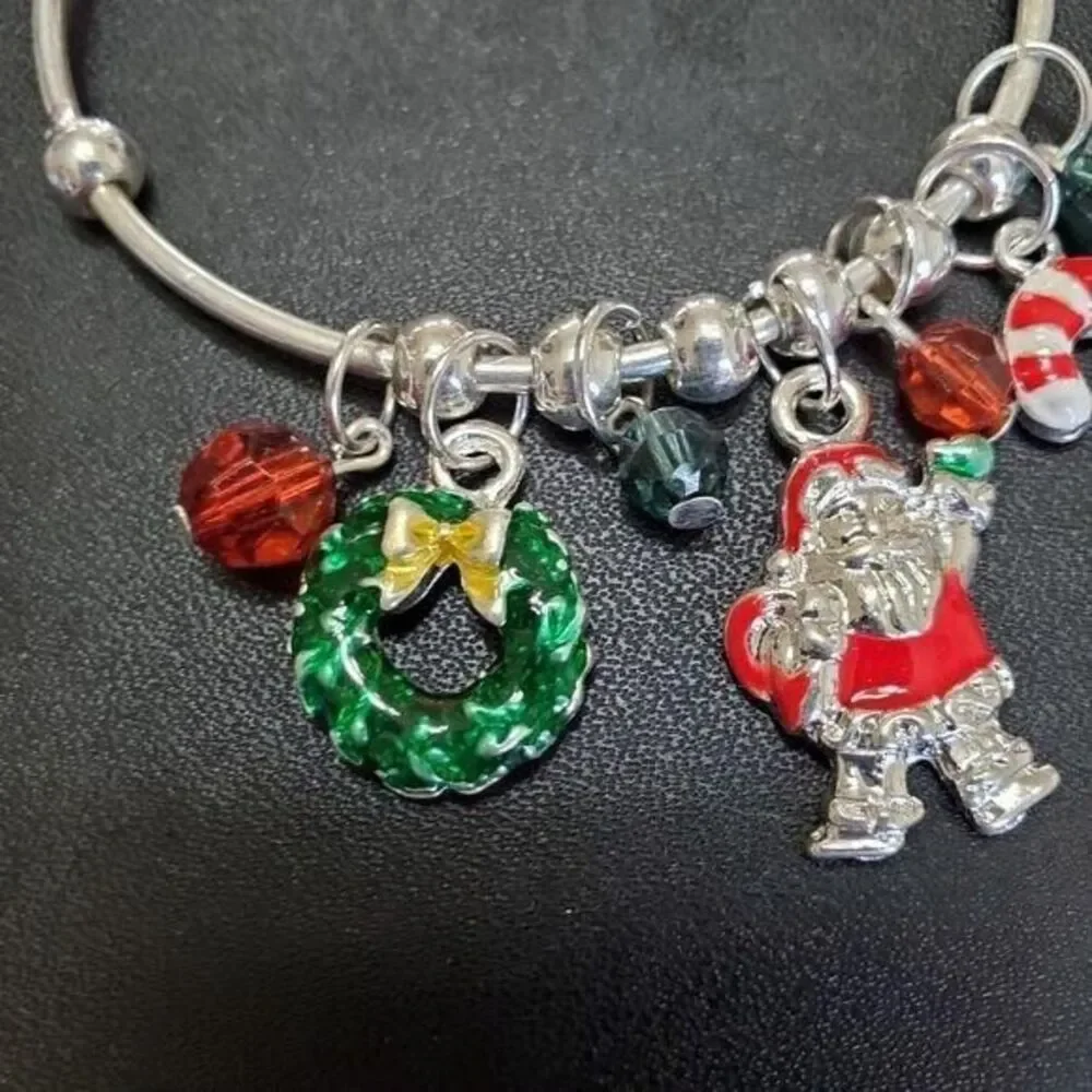 Silver tone child's holiday charm bracelet 6.25